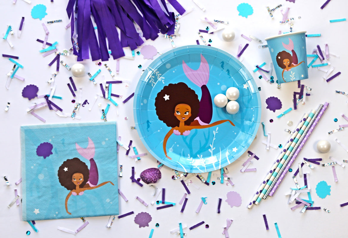 mermaid party supplies on table
